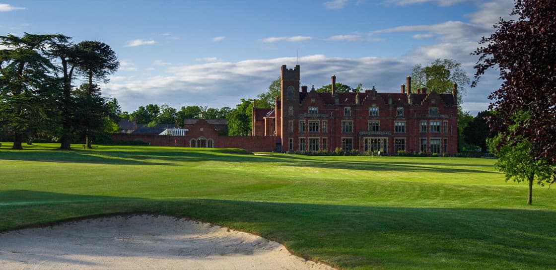 The Hertfordshire Golf & Country Club course with the mansion behind